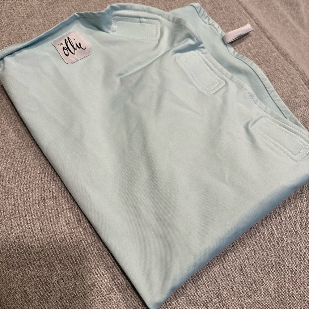 Ollie swaddle in mint green, EEUC